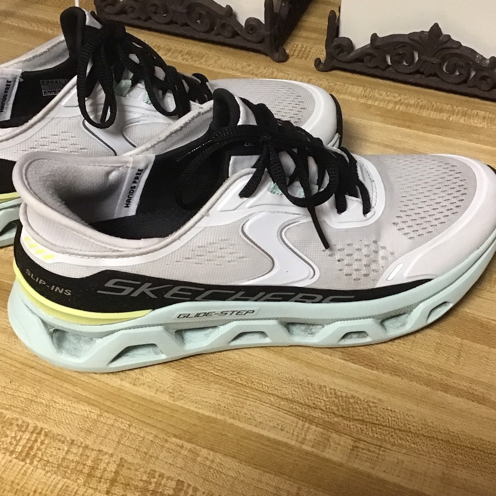 Skechers White and Black Glide-Step Slip-Ins